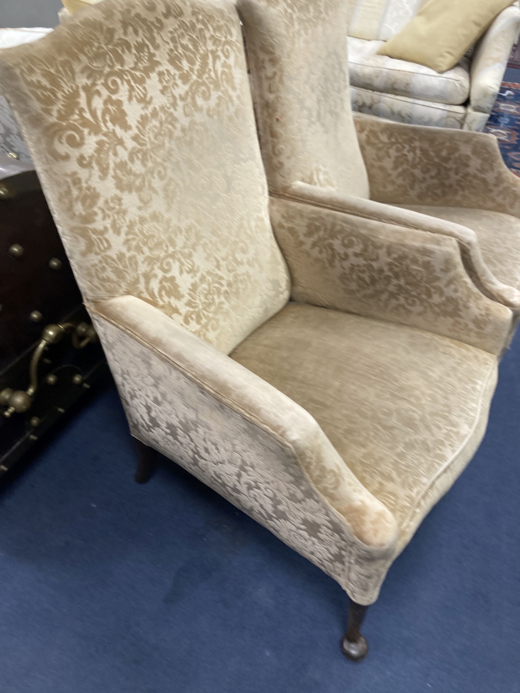 A pair of 1920s upholstered armchairs, width 70cm, depth 70cm, height 102cm